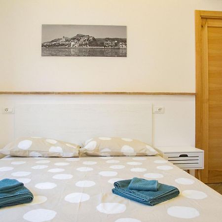 Finestra Sul Borgo Apartment เตรวินญาโน โรมาโน ภายนอก รูปภาพ